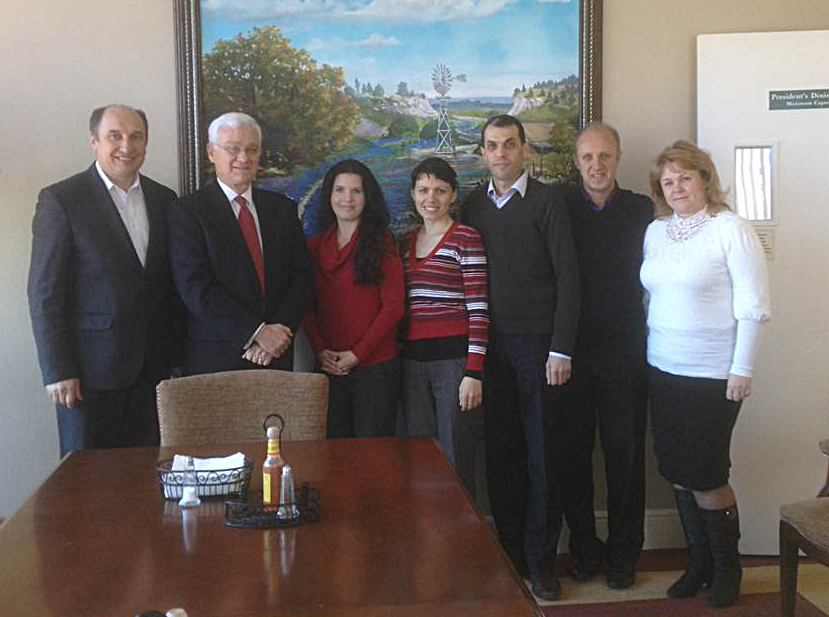 The delegation from the Euro-Asian Division poses in the President's Dining Room during their visit. From left: Moisei Ostrovski (union president for Belarus), Eric Anderson, Monica Kowarsch, Lilia and Andrei Moldovanu (union president for Moldova. Lilia works in Women's Ministry), Zhan and Zhana Tranyuk (Union president for East Russia. Zhana is a doctor of therapy and massage). Not pictured: Vyacheslav (Slava) Buchnev (secretary of the Union in Belarus).