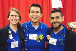 Mauricio Negrete, Southwestern senior nursing major (center) stands with Annalise Lang, a volunteer from California and Dr. David Chang from Australia.